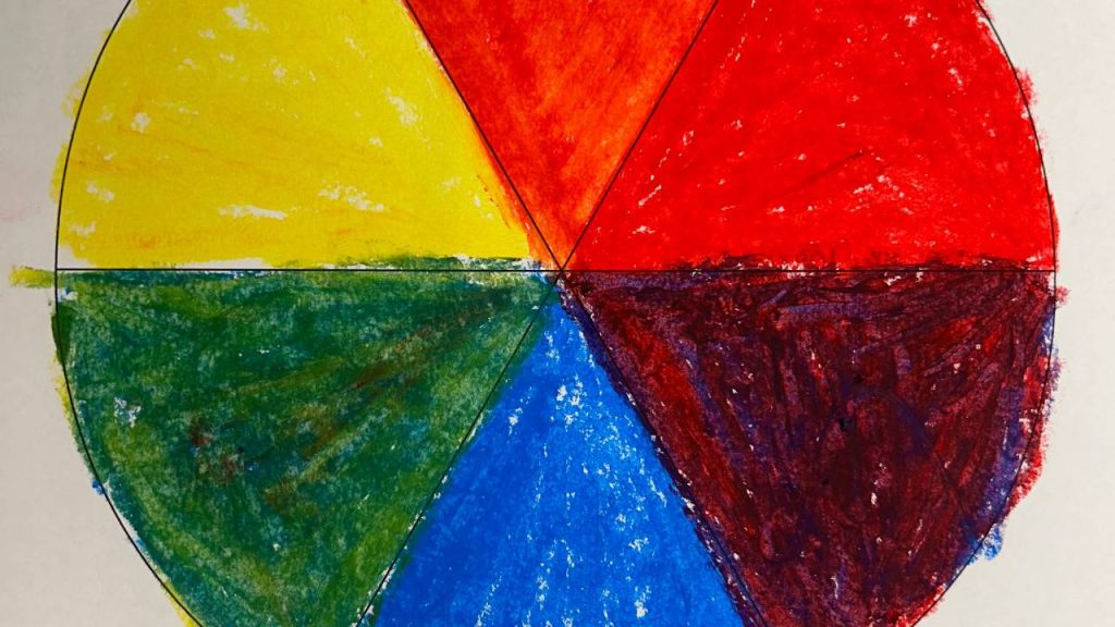 A six-section color wheel is hand-colored